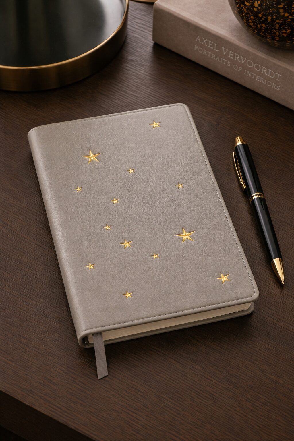 A leather journal with a custom celestial motif.